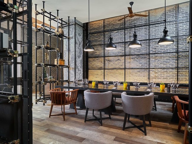 Renaissance Nusa Dua Resort Backstage Bali Private Dining Room eclectic industrial design with warm natural light